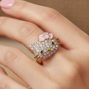 Sanrio Hello Kitty Rhinestone Ring Gold Tone Iridescent AB Crystals Pink Bow